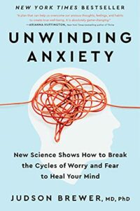 book cover for unwinding anxiety by judson brewer 